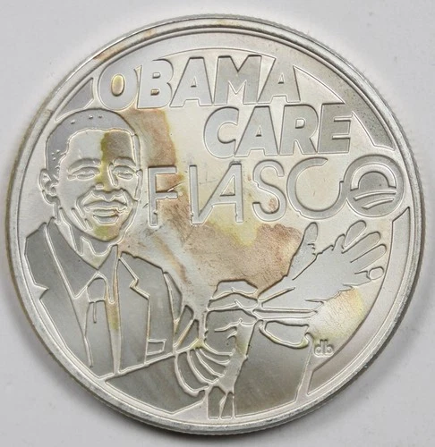 2016 Obama Care Fiasco Silver Shield .999 Silver Shield Round 1 oz COA