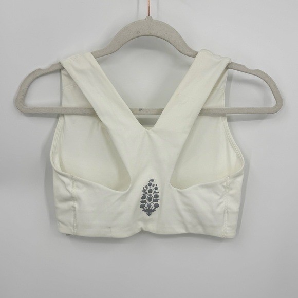 Free People Win Win high-impact sports bra in an off-white color sz S