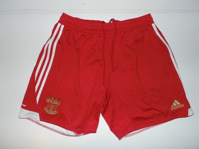 red adidas football shorts