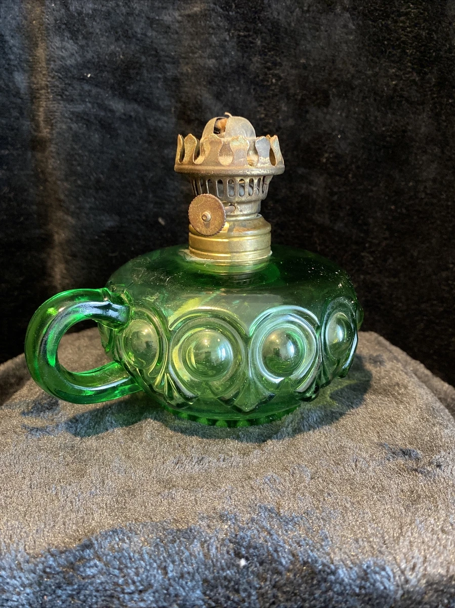 Green glass outlet oil lamp
