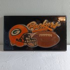 1990's 10 1/8" wide by 5 3/4" high Green Bay Packers Lacquered Wood Wall Plaque