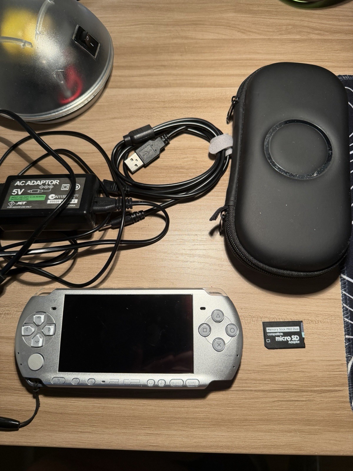 Silver Sony PSP 3000 with game- custom firmware - Charger And New Battery Bundle