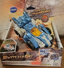 VTECH.. SWITCH  GO.. TRICERATOPS RACE CAR.. EASY TO TRANSFORM..NEW IN PACKAGE