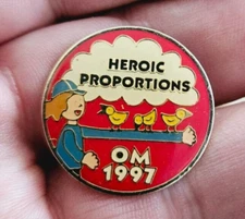 OM 1997 Heroic Proportions Metal Pinback