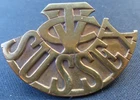 WW1  SUSSEX VOLUNTEER TRAINING CORPS VTC SHOULDER TITLE (BRASS)(47.1M X 32.1M(1)