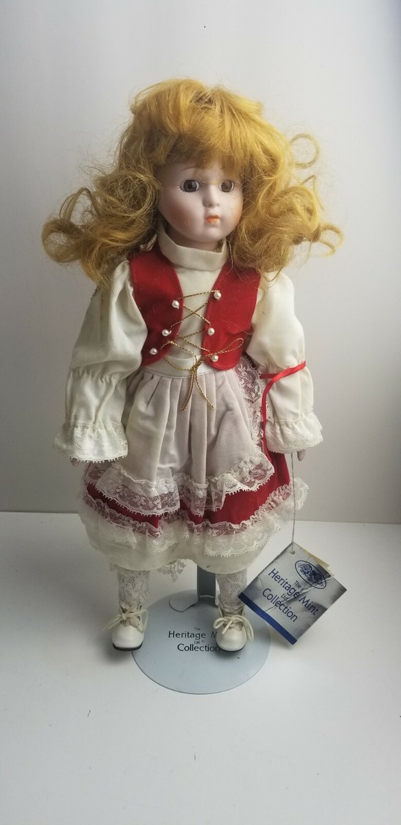 THE HERITAGE MINT LTD. COLLECTION, PORCELAIN DOLLS - HEIDI 16