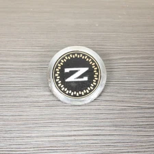 1984-1989 Nissan 300ZX Z31 FRONT BUMPER EMBLEM BADGE Z LOGO SIGN DECAL PLATE OEM