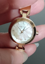 DKNY Wrist watch/ bracelet strap in gold (not brassy looking) keeps good time GC