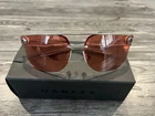 Oakley Chrystl Satin Chrome sunglasses with PRIZM Beryllium lenses, clear frame