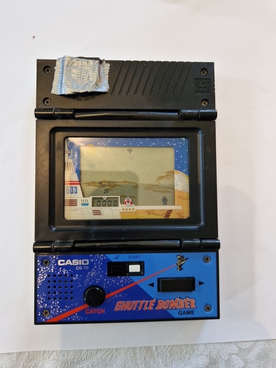 Casio 1983 CG-70 Shuttle Bomber Electronic Handheld Video LCD Game