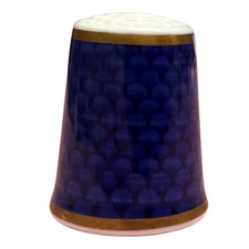 Royal Worcester porcelain thimble featuring a printed blue scale pattern