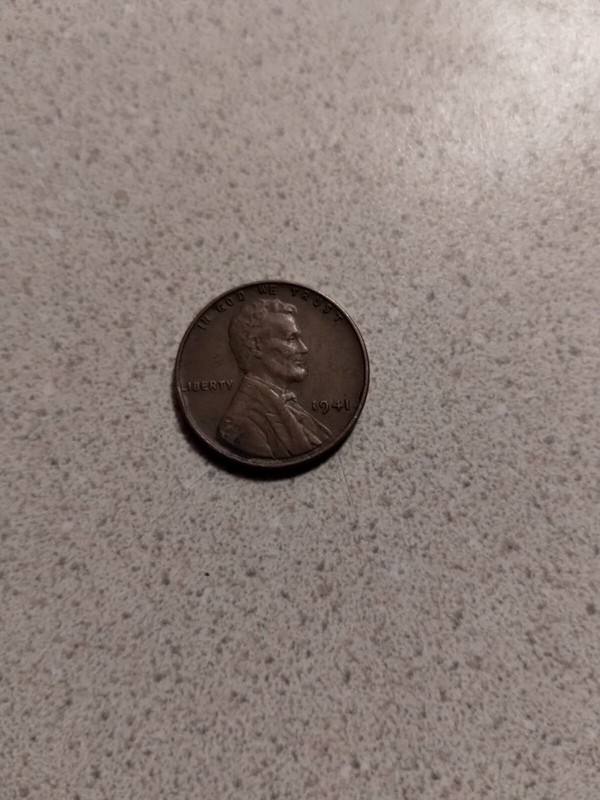 1941 copper penny no mint mark,L Close To The Rim +12 random sport mint cards.