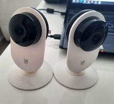 Pair of YI Home 1080p WiFi Cameras with Power...