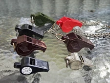 Vtg Collection Of 7 Whistles Blaster Acme US Army Avone Etc... Bakelite? Wood?