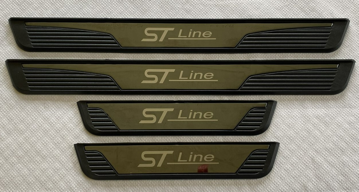 FORD KUGA 2020+ DOOR SILL SCUFF PLATES LOGO ON ABS SUBSTRATE BLACK