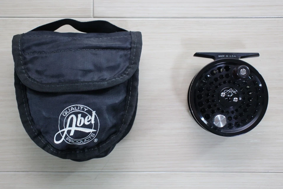 Carrete de mosca Abel TR1 negro 23/4" 3-4wt con caja bolsa papeles hecho en EE. UU. Excelente D25 Foto 2 de 4