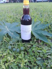 32 oz of haitian black castor oil/Lwil Masket...