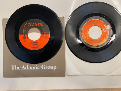 FOREIGNER Hot Blooded & SUPERTRAMP It's Raining Again 45's