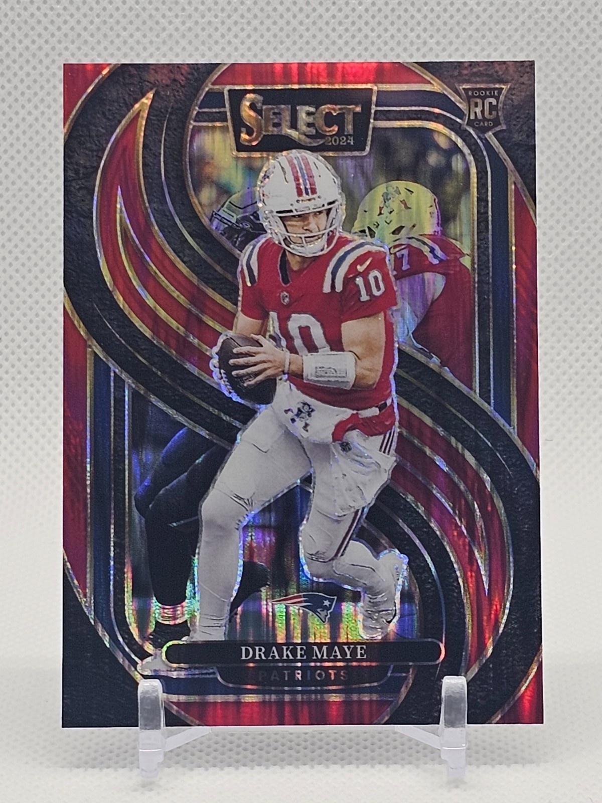 2024 Panini Select Premier Level Drake Maye #113 Red Shock Prizm /249 (RC)