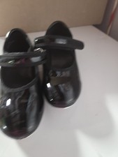 Girls sized eleven tap shoes with hook and loop straps , black