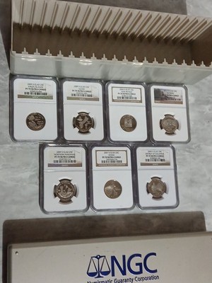 Lot Of 7 Pictured NGC PF70 Ultra Cameo Clad Quarters With NGC Case, See List
