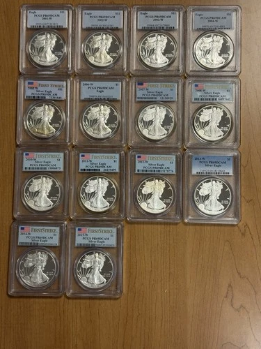 14 US Silver Eagles ALL WEST POINT MINT, ALL GRADED PCGS PR69 DEEP CAMEO.