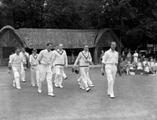 The Duke of Edinburgh leads team out to field in a cricket mat - 1958 Old Photo