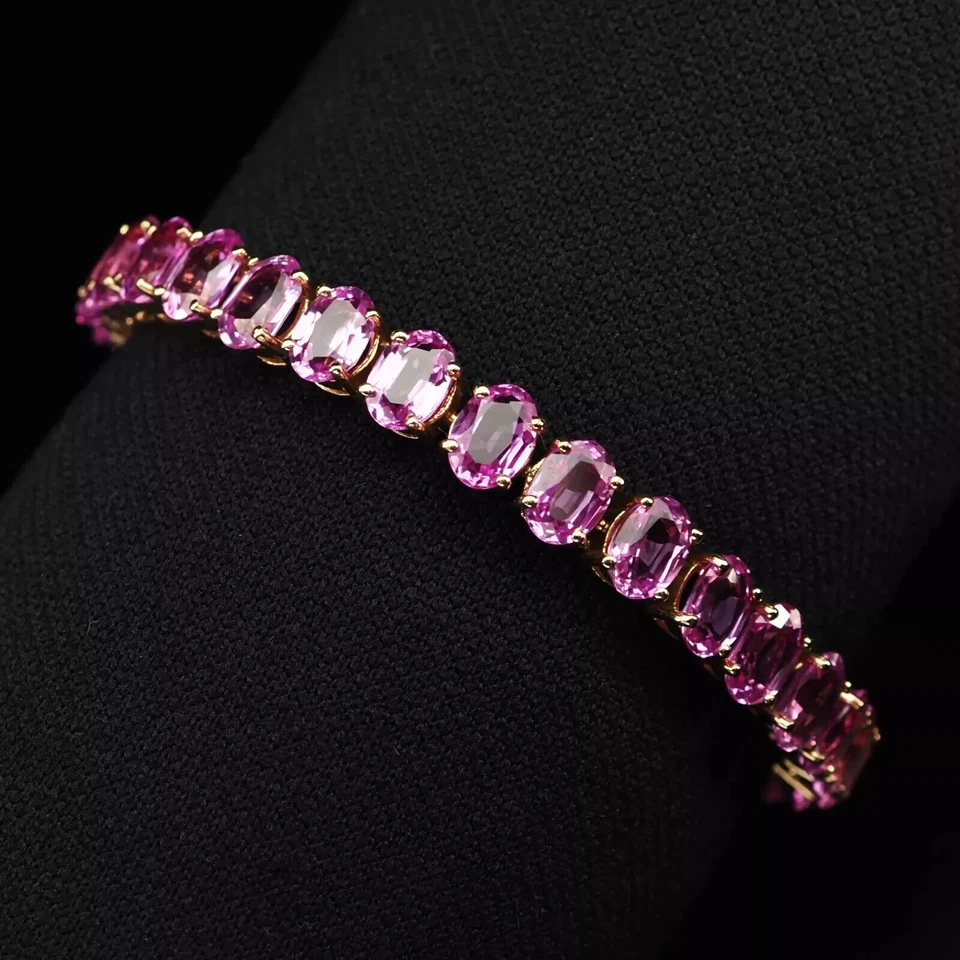 Brazalete tenis zafiro rosa creado en laboratorio corte ovalado de 4 quilates enchapado en oro amarillo de 14 k Foto 2 de 2