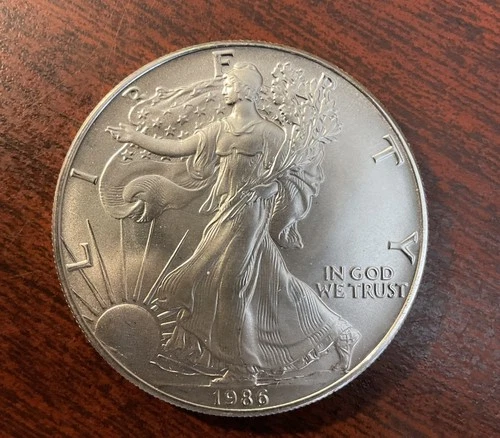 1986 1 OZ SILVER EAGLE .999 FINE SILVER