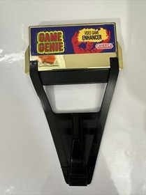 Nintendo Game Genie Video Game Enhancer NES With Manuals & Inserts