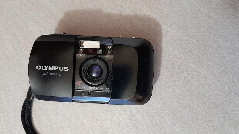 OLYMPUS DA COLLEZIONE ANNI 60/ 70 MOLTO SEMPLICE DA USARE BATTERIA SCARICA - Immagine 2 di 4