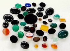 Lot of 100 Carats of assorted loose gemstones varied size and shape Cabochon