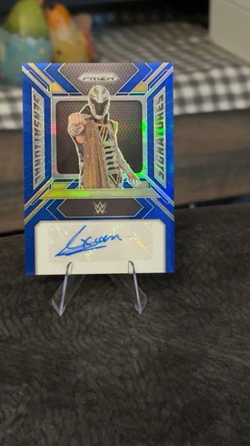 2024 Panini Prizm WWE - Sensational Signatures Axiom #SS-AXI Blue Prizm /49 (AU)