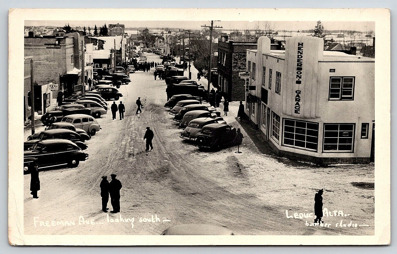 VINTAGE OLD POSTCARD PHOTO CITY STREET STORES CARS PEOPLE WINTER LEDUC, ALTA