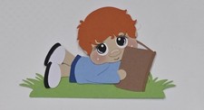 Reading Boy Laying Red Hair. Scrapbook, Card Making Paper Piecing
