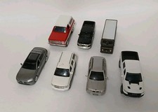 Lote de 7 Diecast a escala diferente, Chevrolet, Ram, UPS, BMW, Dodge, Blazer