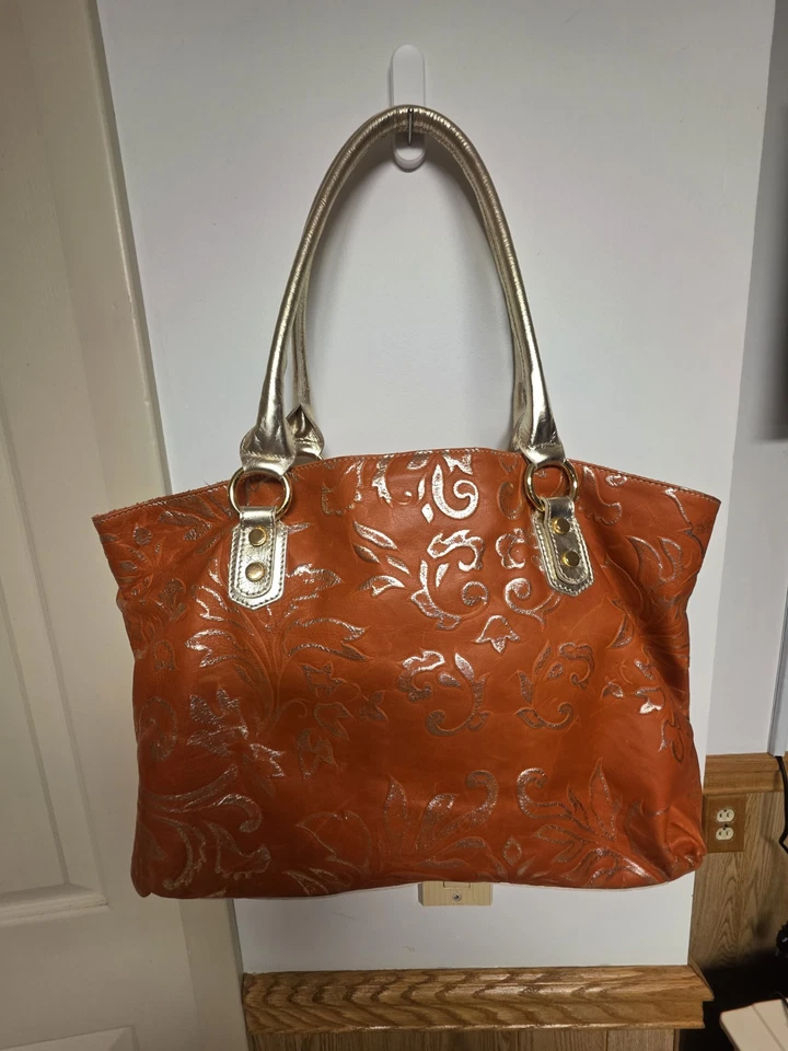 Bolso de Mano Cavalcanti Naranja y Cuero Metálico Floral Remolino Foto 2 de 3