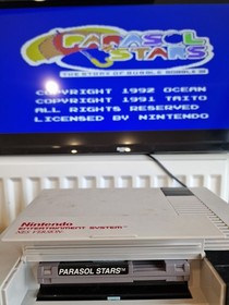 Sistema de entretenimiento Parasol Stars: Rainbow Island II NES Nintendo en caja