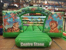 BOUNCY CASTLE JUNGLE BRAND NEW 10FTX12FT with blower