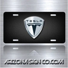 TESLA Inspired Art on Simulated silver Carbon Fiber Aluminum License Plate Tag