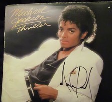 Michael Jackson Autographed Thriller Cover with Photo-PROOF & COA