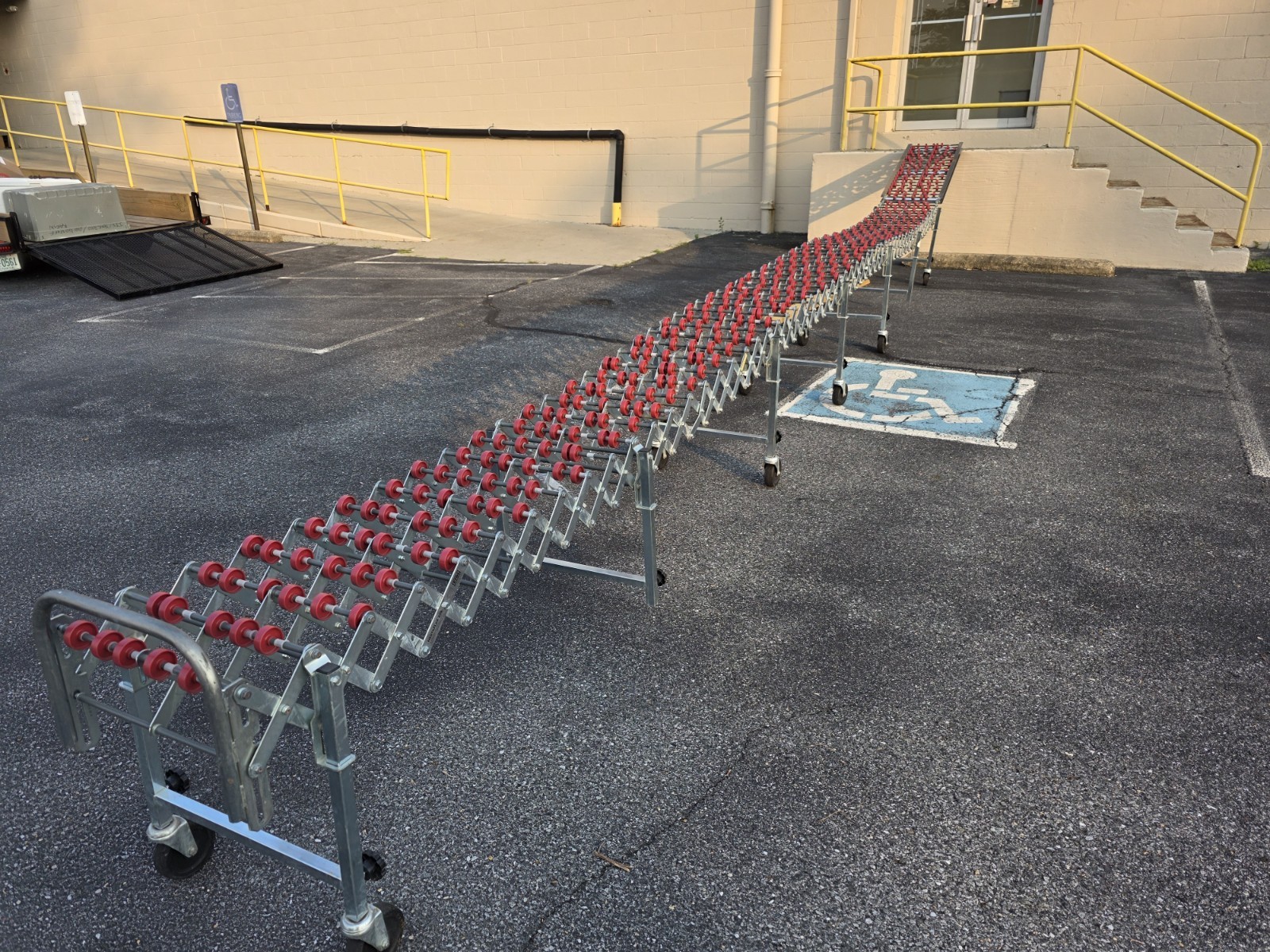 Nestaflex 226 expandable skate wheel conveyor 24' 8" expanded 18" wide steel