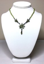 Natural Faceted Peridot, Solid Sterling Silver Knotted Necklace, 16 1/4" long.