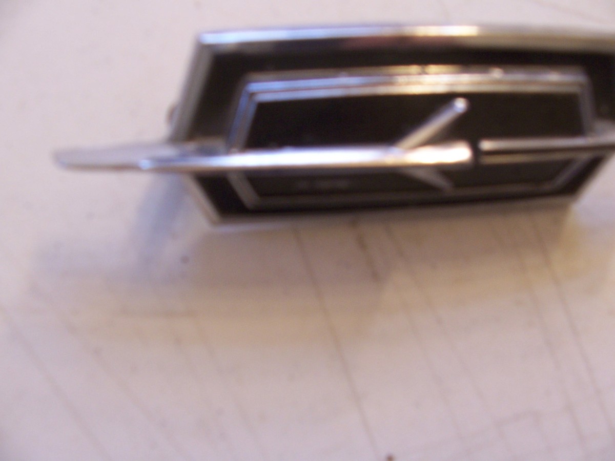 1974 OLDS DELTA 88 HEADER TRIM EMBLEM ORNAMENT OEM USED OLDSMOBILE