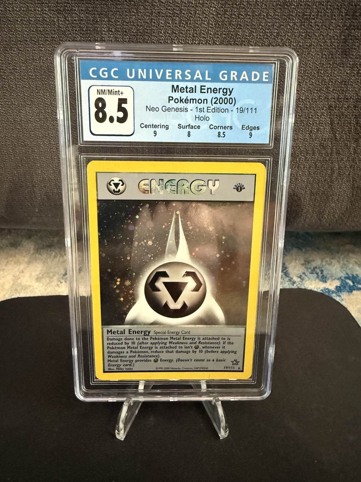 2000 POKEMON NEO GENESIS 1ST ED #19 METAL ENERGY-HOLO PSA 8