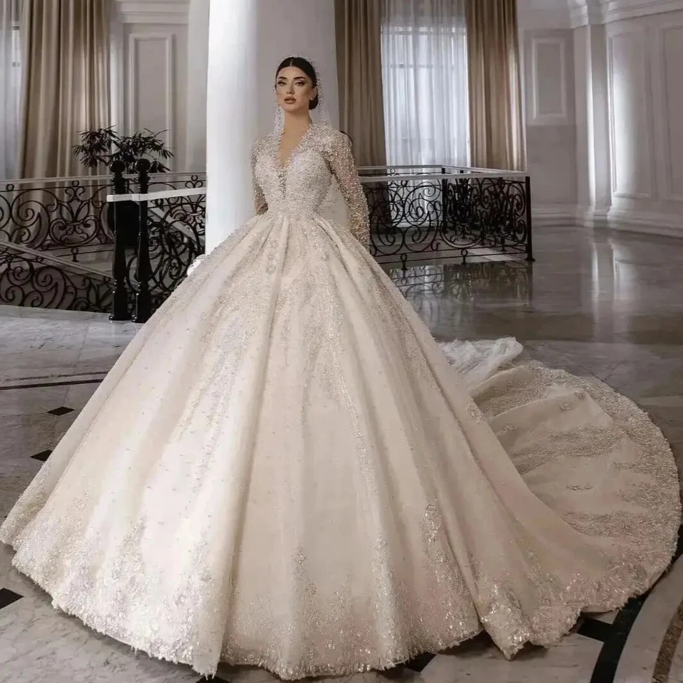 Vestidos de novia de princesa de lujo con apliques de encaje manga larga cuello en V Foto 4 de 4