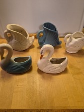 Lot of Different color swan planters/vase Mos...