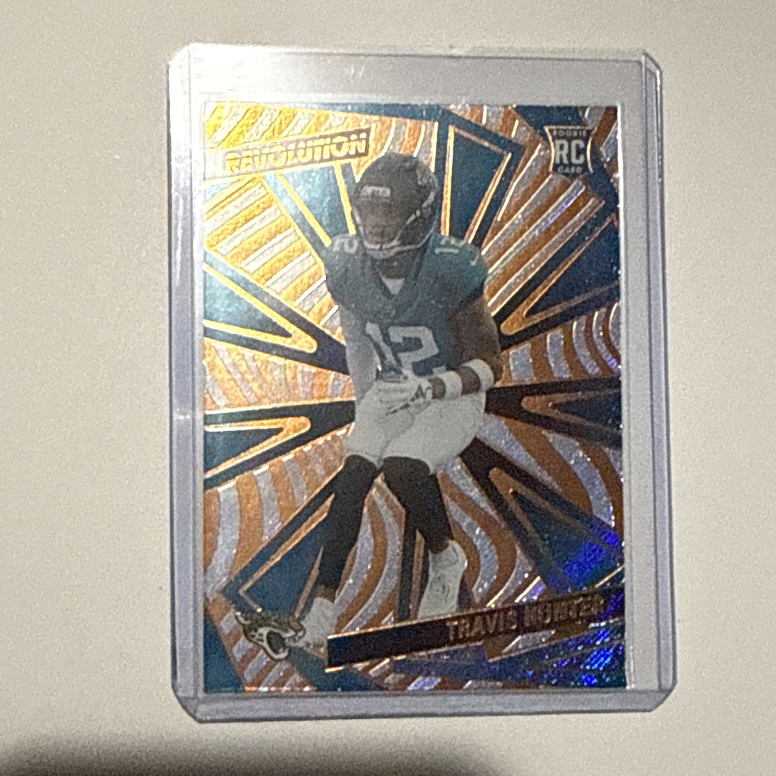 2025 Panini Revolution - Rookies Travis Hunter #242 Sunburst /18 (RC)