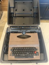 Vintage 1970s Sears electric typewriter Model 161.53970 with carrying case thumbnail