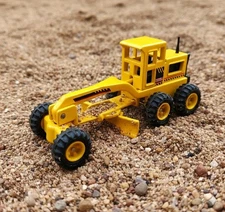 Vintage Tonka Yellow Road Grader Die-Cast Toy Construction Vehicle Ornament